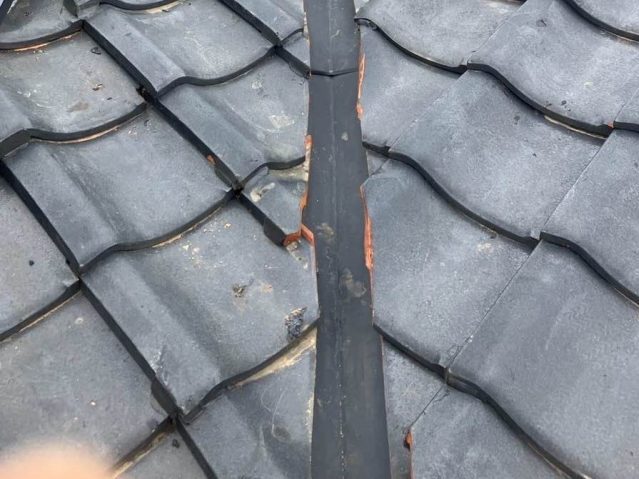 粕屋町で交換された谷板金