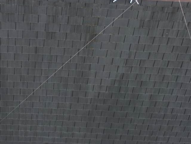 福岡市早良区の調査で確認されたスレート屋根の強風被害